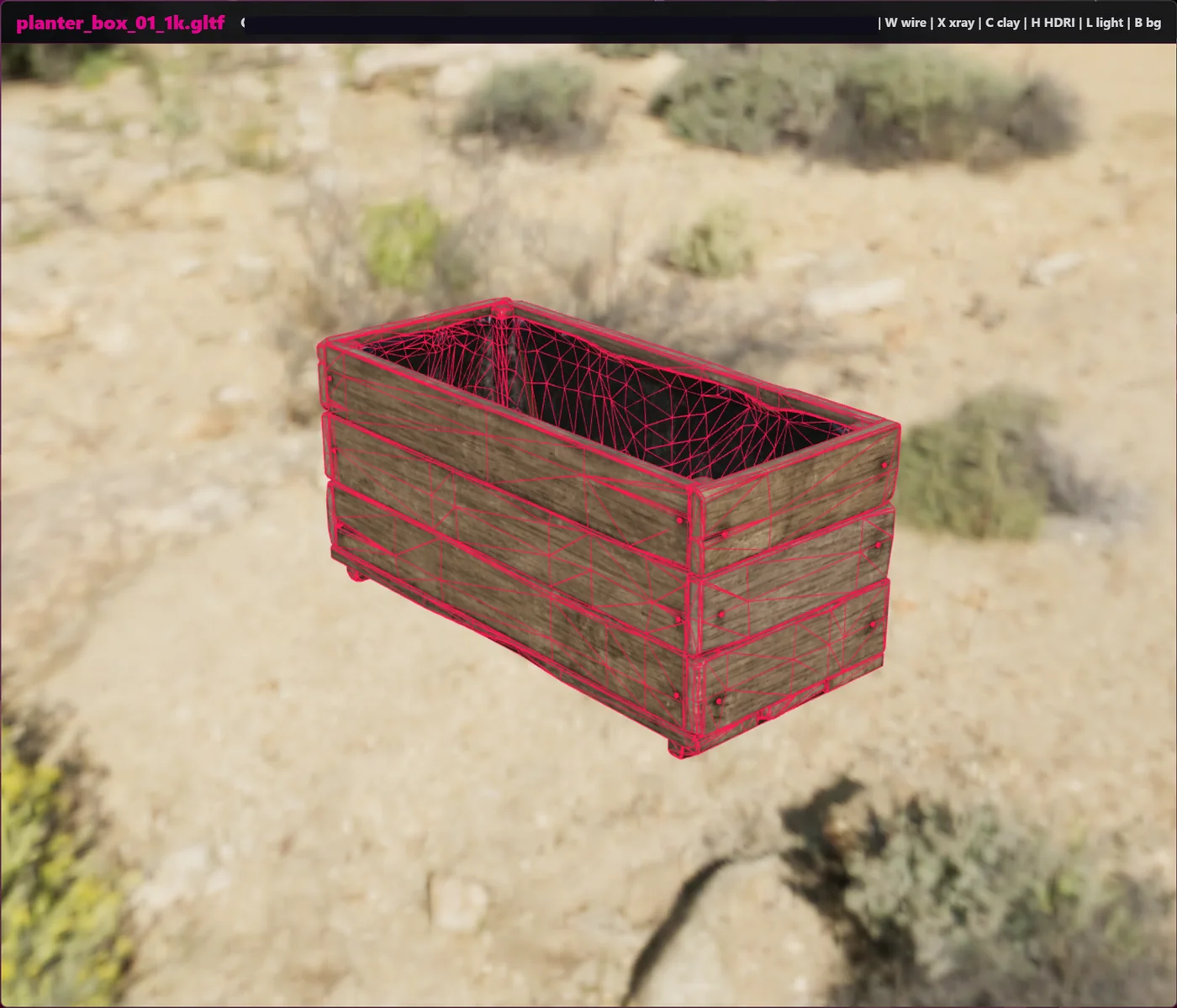 A planter box model shown with a bright wireframe overlay to inspect topology.
